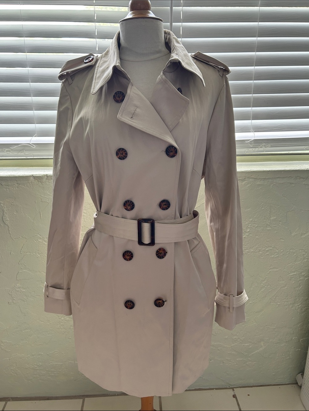 Joan Rivers rain coat